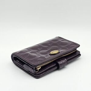 Purple Embossed Coach Wristlet